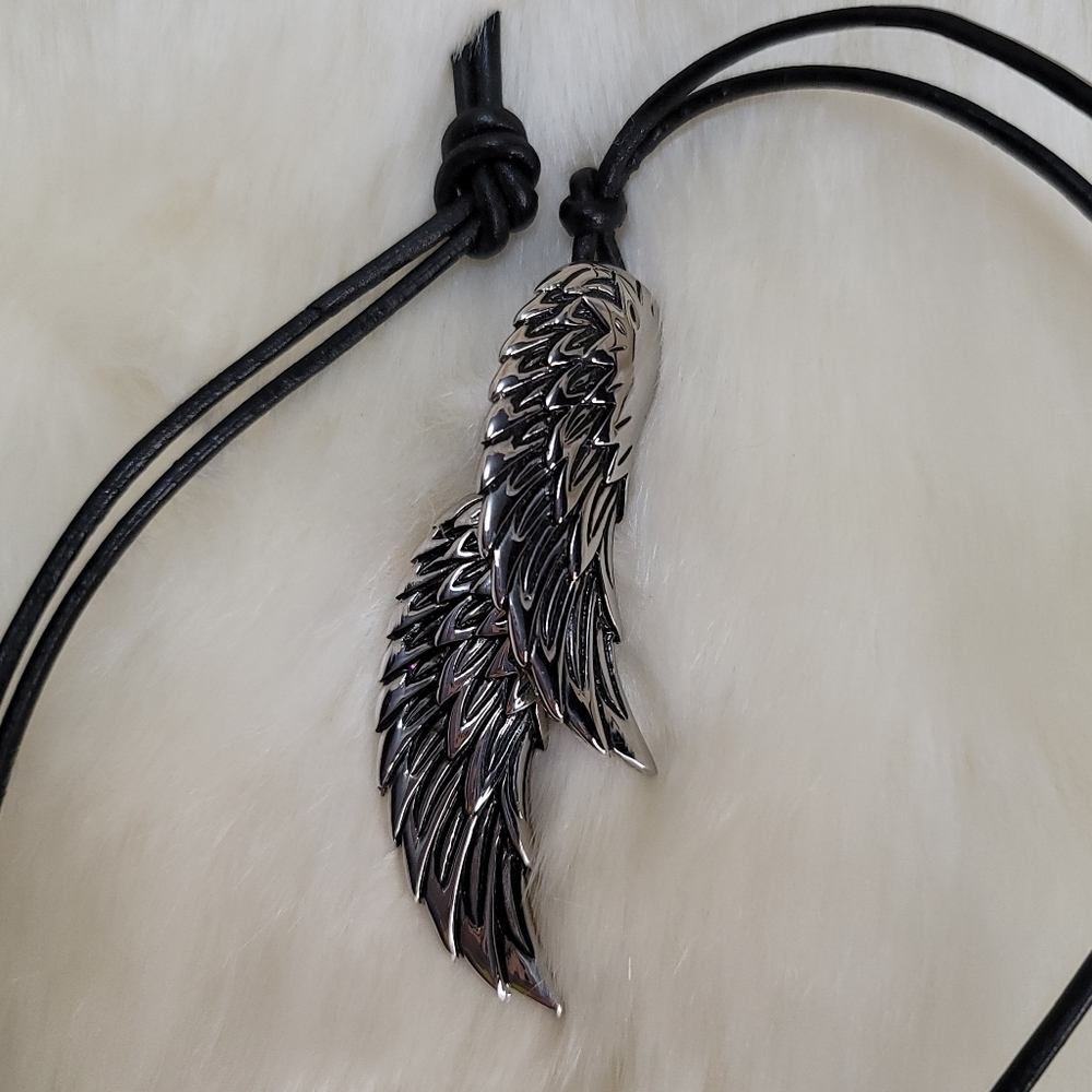 Stainless steel wings pendant on leather cord by Chisel